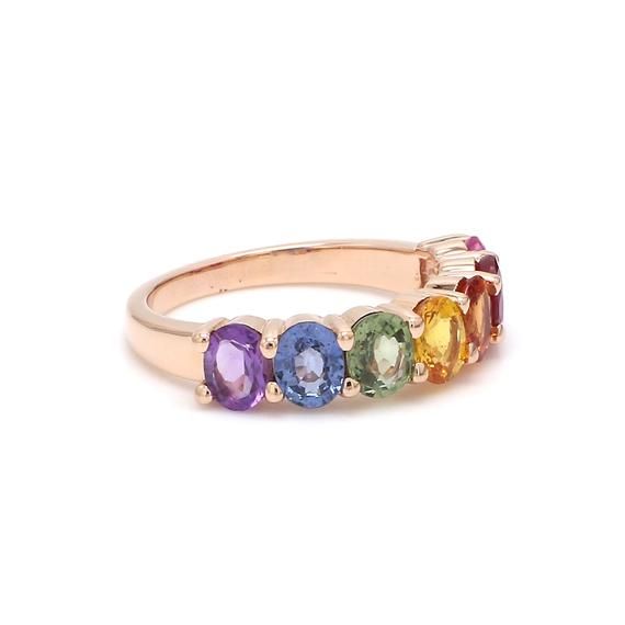 Rainbow sapphire amethyst ruby eternity band ring in 14k 18k gold, Natural rainbow gemstone ring, Rainbow ring gold, Seven chakras ring goldSTONE DETAILS :✦ Gemstone: Rainbow Sapphire, Ruby, Amethyst✦ Gemstone Type : Natural✦ Gemstone Size : 5x4 mm✦ Gemstone Shape : Oval cut✦ Number of gemstones : 7✦ Gemstone Weight : 3-4 carats✦ Gemstone Grade : AAAMETAL DETAILS :✦ Metal : 14K/18K Gold✦ Metal Color : Yellow / White / Rose Gold✦ Setting : Shared Prong Setting✦ Ring Box : YesSHIPPING DETAILS :✦ S Yellow Gold Multi-stone Round Cut Jewelry, Rose Gold Sapphire Jewelry With Multi-stone, Rose Gold Multi-stone Sapphire Jewelry, Rose Gold Sapphire Multi-stone Jewelry, Elegant Oval Rainbow Rings, 14k Gold Multi-stone Round Gemstones, 14k Gold Multi-stone Round Jewelry, Fine Jewelry Sapphire Ring With Multi-stone, Fine Jewelry Multi-stone Sapphire Ring