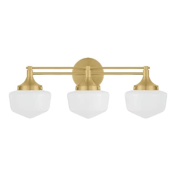 three light bathroom fixture in an antique brass finish