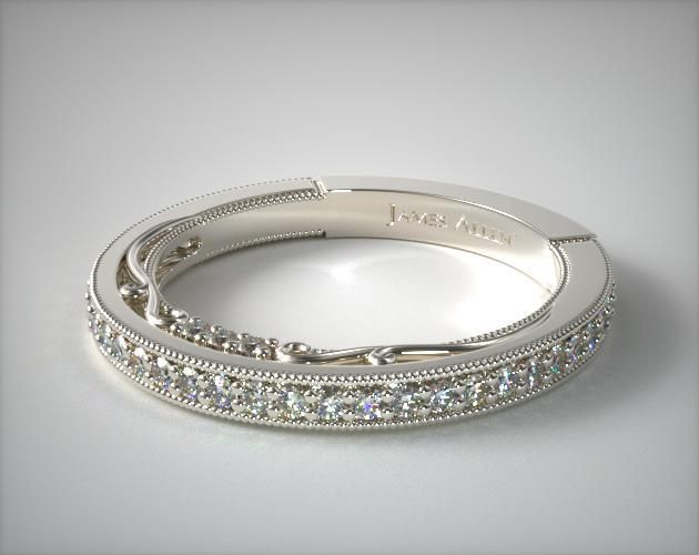 the wedding band has been made with white gold and is set with round brilliant cut diamonds