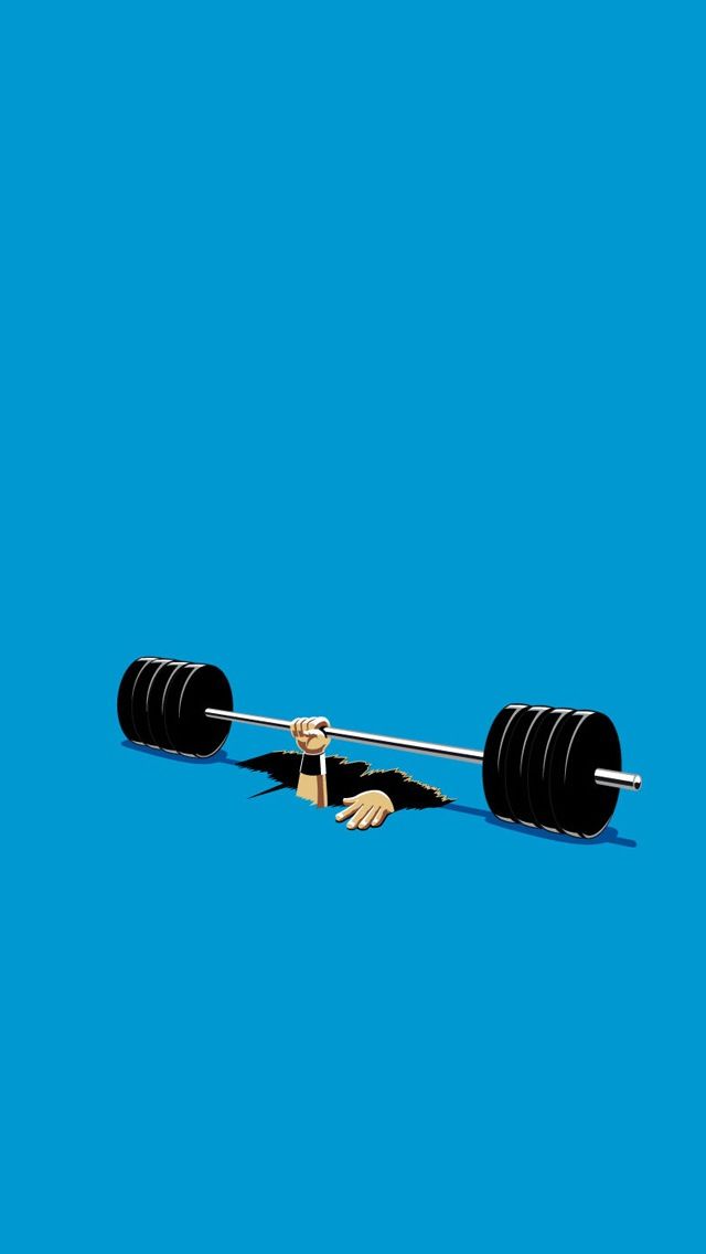 a barbell is laying on the ground in front of a blue background