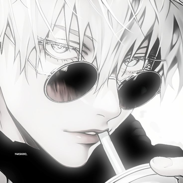 an anime character with glasses holding a cell phone to his ear and looking at the camera