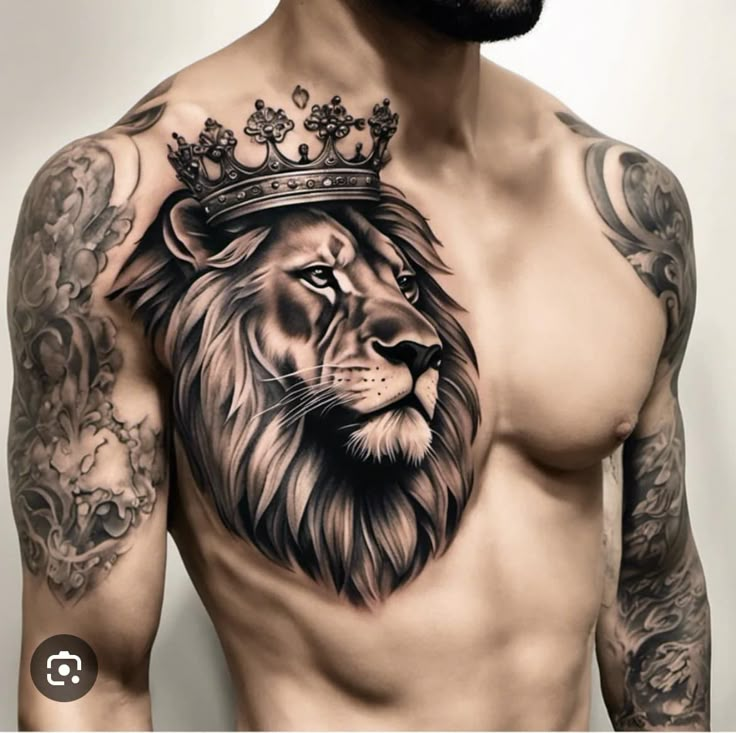 a man with a lion and crown tattoo on his chest is wearing a black hat