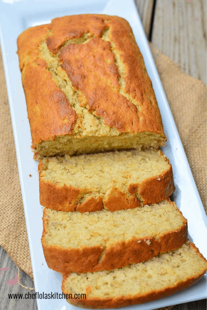 sliced loaf of banana bread on a white plate