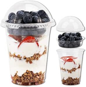 yogurt with granola, berries and blueberries in a plastic container on a white background