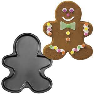 This recipe makes enough to fill 1 Wilton gingerbread cookie mold. 1/2 cup shortening 1/2 cup sugar 1/2 cup molasses + 2 TBS 1 egg 2 1/2 cups flour 1/2 teaspoon baking soda 1/2 teaspoon salt 1... Gingerbread Man Cookie Recipe, Cookie Pan, Refrigerated Cookie Dough, Pan Cookies, Pan Recipe, Giant Cookie, Ginger Bread Cookies Recipe, Man Cookies, Gingerbread Recipe