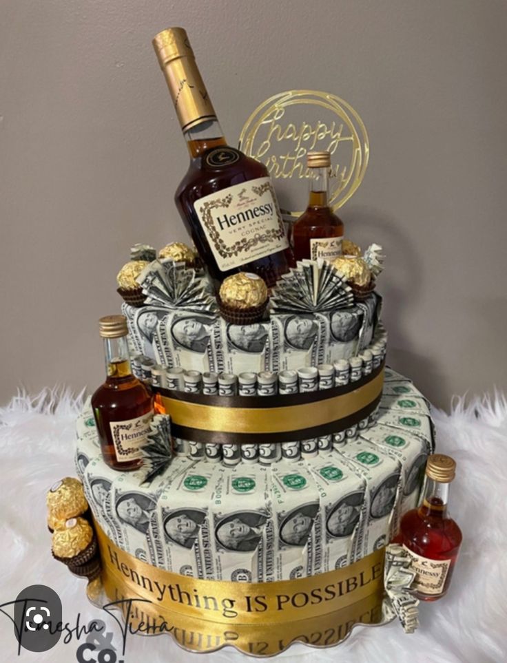 a cake made to look like money and liquor bottles