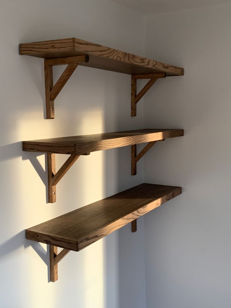 3 shelves on brackets Woodworking Projects Shelves, Wooden Hanging Shelves, Homemade Shelves Bedroom, Hanging Wooden Shelf, Wall Bedroom Shelves, Wooden Shelves With Brackets, White And Dark Wood Furniture, Wooden Wall Rack Shelves, Wooden Shelves For Bedroom