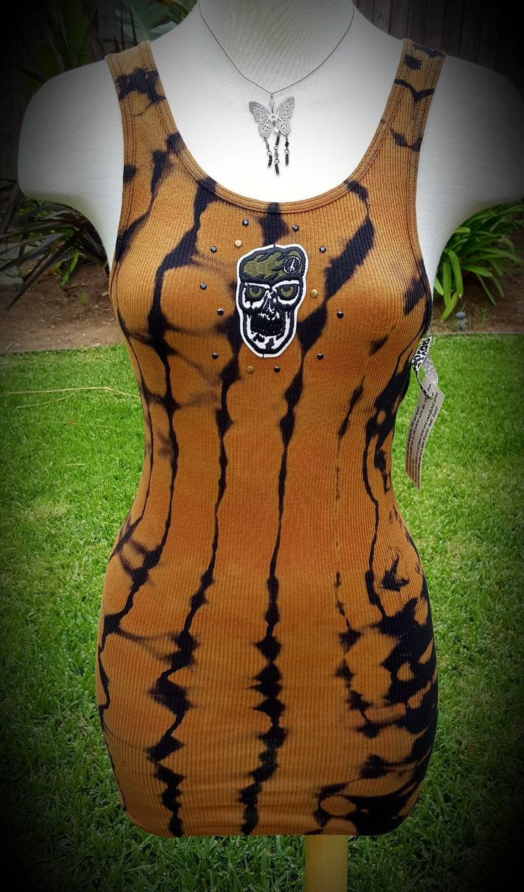 "Amazing reverse tie dye tank top! This tank is a One of a Kind! Pre-washed 100% cotton, Hand dyed Vintage Military Green Beret patch in Skull shape head with Black and brass studs around the skull. Black/brown reverse tie dye, long length, wife beater style. Clear Swarovski crystal \"Roxxtar\"logo in the back. Size Medium Large, it stretches. Thanks, Enjoy! #tiedye #gothic #hippie #gift #boho #rocker #goth #punk #unisex #biker #rockabilly #folk #tribe #dope #sick #style" Wife Beaters, Rocker Look, Skull Patch, Reverse Tie Dye, Green Beret, Cute Scarfs, Special Ops, Punk Rocker, Tie Dye Tank Top