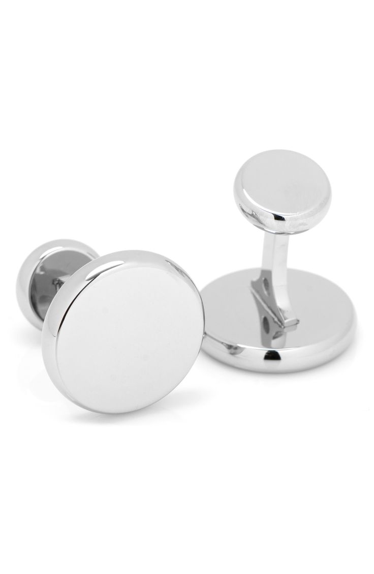 Minimalist and simple, these versatile silvertone cuff links look smart on their own and make a polished canvas for your own engraving. 3/4" diameter Stainless steel Imported Classic Round Sterling Silver Cufflinks, Modern Adjustable Cufflinks For Business, Modern Silver Cufflinks, Modern Sterling Silver Cufflinks With Polished Finish, Modern White Gold Sterling Silver Cufflinks, Classic Round Adjustable Cufflinks, Modern White Gold Cufflinks With Polished Finish, Modern Cufflinks As Gift, Modern Round Cufflinks As Gift