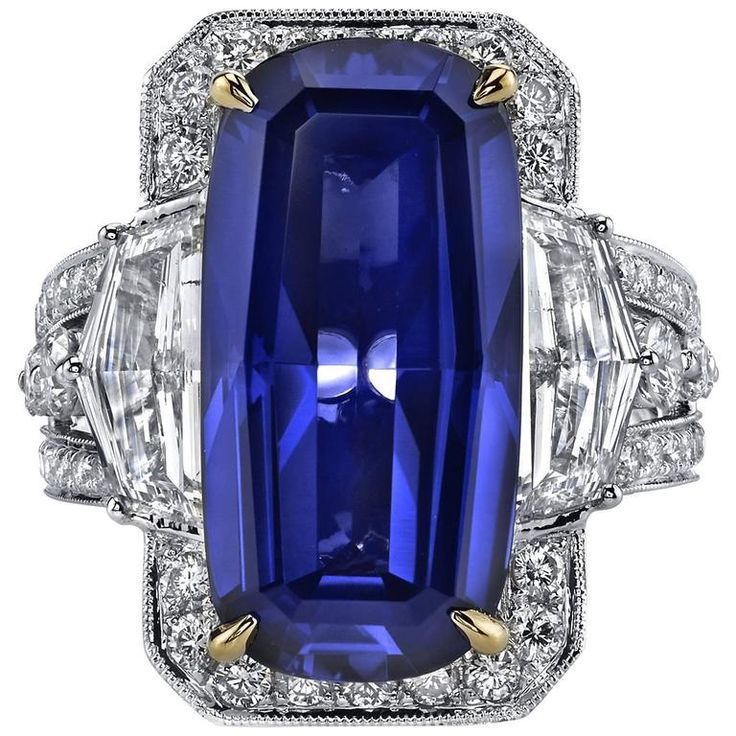 Tanzanite Diamond Gold Ring Elegant Tanzanite Diamond Cut Ring, Luxury Tanzanite Emerald Cut Ring, Luxury Tanzanite Diamond Ring Gia Certified, Luxury Tanzanite Ring With Diamond Cut, Formal Tanzanite Trillion Cut Ring, Luxury Octagon Brilliant Cut Sapphire Ring, Luxury Octagon Sapphire Ring With Brilliant Cut, Luxury Gia Certified Tanzanite Diamond Ring, Luxury Tanzanite Diamond Ring With Emerald Cut