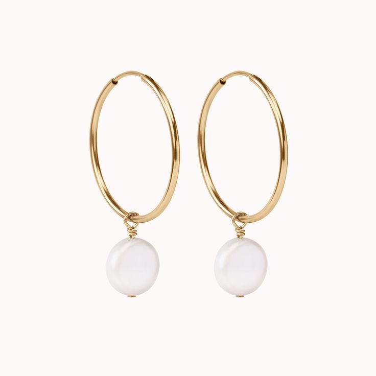 Simple and effortless enough for everyday wear, but classy enough to take you straight into the evening! Channel your inner goddess with these beautiful, freshwater pearl hoop earrings. Handcrafted in our Salt Lake City studio ✨ Hoop Pearl Earrings With Pearl Pendant, Pearl Pendant Hoop Earrings, Everyday Pearl Earrings With Pearl Charm, Small Hoop Pearl Earrings For Everyday, Everyday Pearl Charm Earrings, Hoop Earrings With Pearl Pendant, Everyday Small Hoop Pearl Earrings, Classic Pearl Pendant Hoop Earrings, Classic Pearl Charm Hoop Earrings