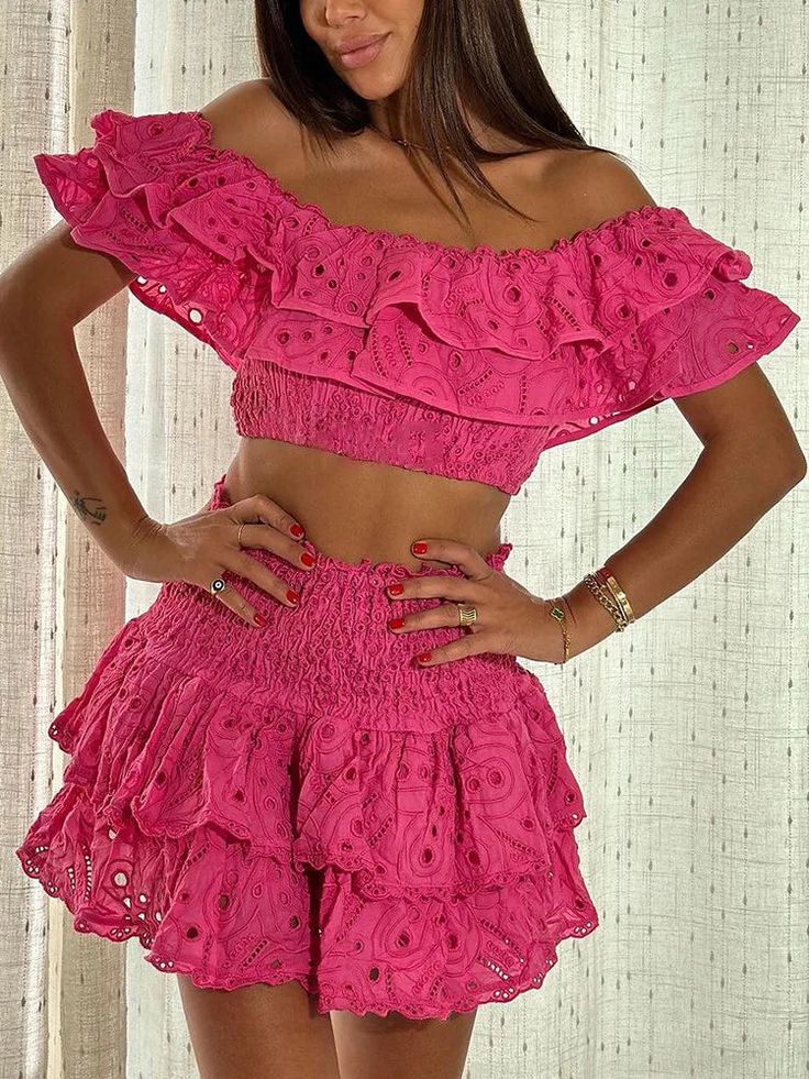 Make a statement with our Tegan Skirt and Top Two Piece Set! This fun and flirty set includes a fuchsia pink embroidered ruffle off shoulder crop top and a matching ruched mini skirt. Show off your playful side with this bold and vibrant outfit! Material: Polyester, Cottom Closure Type: Pullover Silhouette: A-LINE Care: Gentle Wash Fitted Ruffled Skirt Set For Summer, Fitted Ruffle Skirt Set For Summer, Spring Party Skirt Set With Ruffles, Feminine Summer Sets With Ruffles, Summer Party Set With Ruffled Skirt, Party Sets With Ruffles And Short Sleeves, Ruffled Skirt Set For Spring, Pink Skirt Set For Spring, Summer Ruffled Fitted Skirt Set