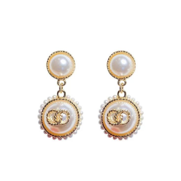 Look elegant and glamorous with these Graceful Glamour Pearl Earrings! These earrings put the “glam” in glamourous! Shine bright with these exquisite earrings and get ready to be the belle of the ball! These earrings feature pearl studs, gold detailing, small pearls circling larger pearl dangles, and a secure post backing. • Earrings measure 2" in length and 1" in width Pearl Embellished Earrings For Party, Glamorous Party Earrings With Pearl Charm, Chic Pearl Drop Clip-on Earrings For Party, Elegant Pearl Charm Clip-on Earrings, Classic Pearl Chain Earrings For Party, Chic Pearl White Earrings For Formal Occasions, Elegant Clip-on Earrings With Pearl Charm, Chic White Earrings With Pearl Chain, White Gold Plated Pearl Earrings For Party