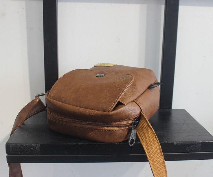 Material: PU
Texture: Soft
Closed: Buckle
Size: 6.3"L x 1.8"W x 5.5"H in; It is enough to hold daily stuffs including cell phones, sunglasses, wallet, key etc.
Baldric: Adjustable shoulder strap School Satchel Phone Bag With Cell Phone Pocket, Brown Crossbody Phone Bag For School, نظارات شمسية, Bag Light, Light Brown, Dark Brown, Fashion Backpack, Shoulder Strap, Buckle