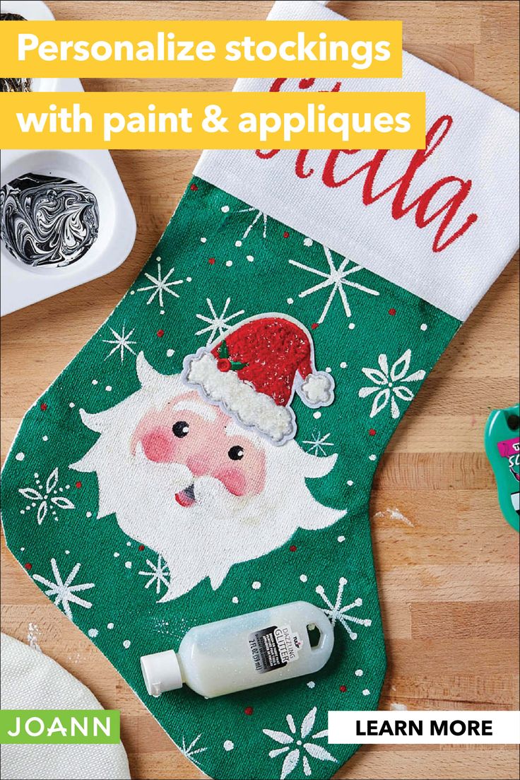 a christmas stocking with paint and appliques is featured in this ad for joann