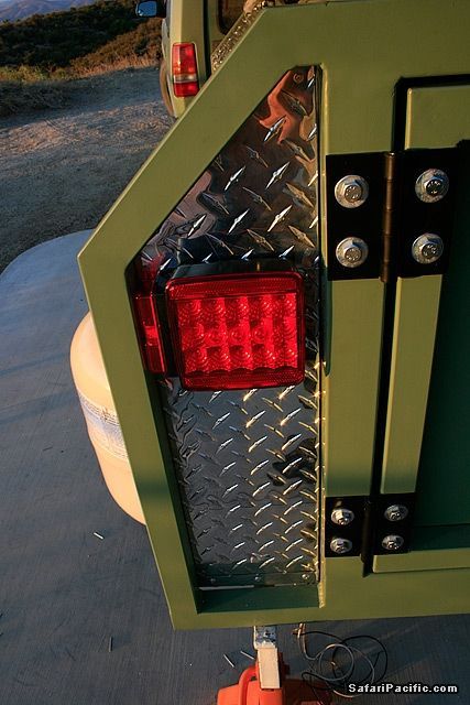 the tail light of a green truck