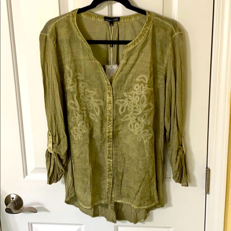 Nwt Sage Color Casual Button Up Blouse. Can Easily Be Dressed Up Or Down. Button Sleeves That Could Be Undone And Worn As A Long Sleeve. Floral Detail. Cute Split On Back! Front Panel Is 100% Rayon. Sleeves And Back Are 100% Cotton. Additional Measurements Available Upon Request. Rayon Button-up Top With Buttons, Casual Tunic Blouse With Buttons, Spring Button Tunic Top, Spring Buttoned Tunic Top, Spring Tunic Top With Buttons, Bohemian Button-up Tops With Buttons, Rayon V-neck Top With Button Closure, Bohemian Tunic Top With Buttons, Fall Rayon Tops With Buttons