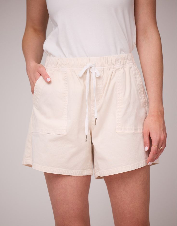 DESCRIPTION

Our Sandbar Shorts are made from light, breathable denim. Featuring a drawstring waist for a customizable fit, their light beige tone pairs effortlessly with various tops for any occasion. 

Designed in Montreal

Imported

Style no. 2539




DETAILS


Closure: Adjustable Drawstring Waistband

Rise: Classic

Inseam: 5.5"

Vegan leather YJ patch at back pocket





SIZE CHART

Trudy is 5'9" and wearing a size 26.

Fit: This style fits true to size. 

Check our size chart to find your Casual Neutral Bottoms For Vacation, Relaxed Beige Bottoms With Drawstring, Casual Neutral Shorts For Beach, Casual Neutral Bottoms With Elastic Waistband, Casual Neutral Shorts For The Beach, Casual Neutral Beach Shorts, Casual Everyday Shorts With Drawstring, Casual Neutral Bottoms With Pockets, White Bottoms With Functional Drawstring For Spring