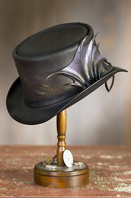 Channeling the power of myth into outlandish fashion, our animated Draco hat… Outlandish Fashion, Sheepskin Car Seat Covers, Scottish Hat, Top Hats For Women, Mens Steampunk, Steampunk Hats, Leather Top Hat, Dapper Grooms, Steampunk Hat