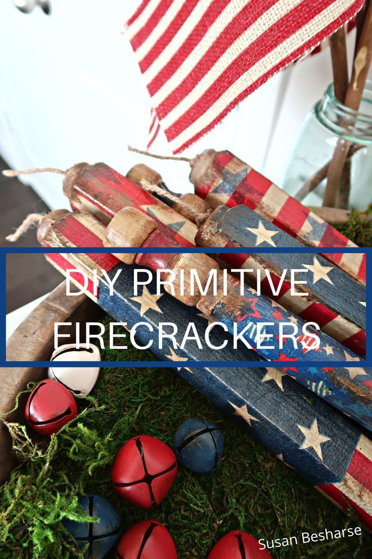 an american flag made out of old wooden sticks and some eggs in the grass with text overlay that reads diy primitive firecrackerrs