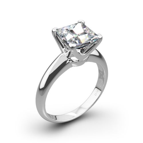 a white gold ring with a princess cut diamond in the center, on a white background