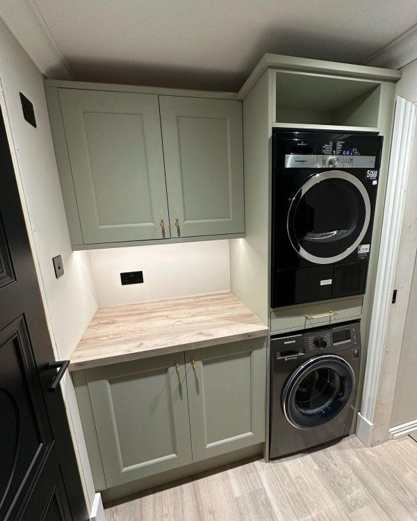 a washer and dryer in a small room