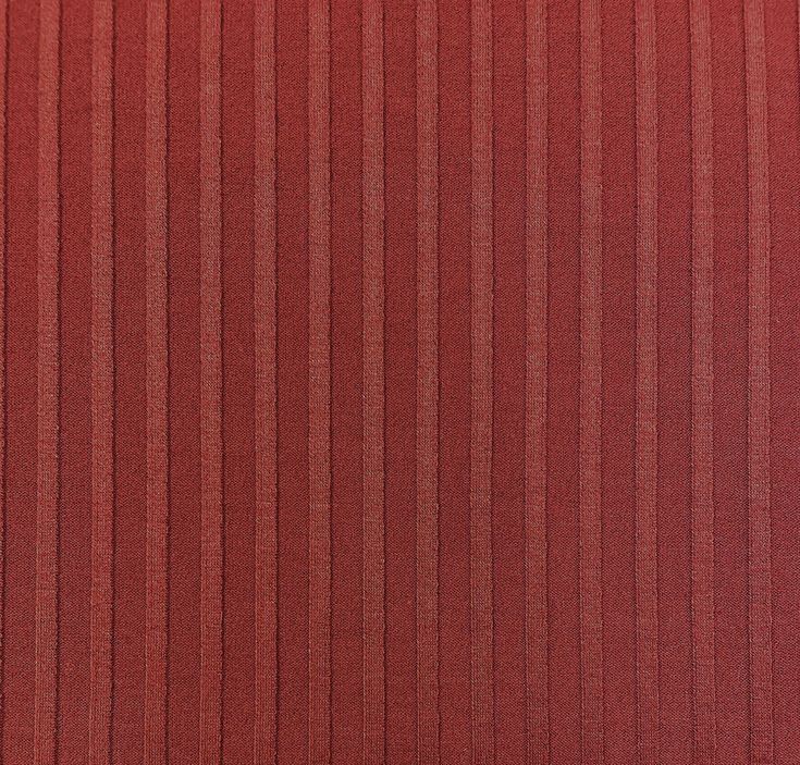 a red striped wallpaper with vertical lines in the center and horizontal stripes on the bottom