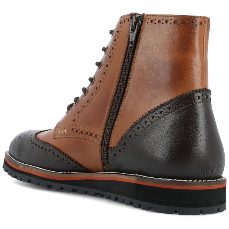 The Elijah boot by Thomas & Vine is crafted with authentic leather and wingtip details for an upscale look. A classic lace-up closure with brogue accents secures this well-made ankle-high style. The style is completed with a 6 mm Comfort Foam� footbed and a modern EVA outsole for a light and comfortable fit. Vintage Lace-up Boots With Brogue Detailing, Brown Goodyear Welted Lace-up Boots For Fall, Leather Wingtip Oxfords For Fall, Casual Wingtip Lace-up Boots With Rubber Sole, Formal Wingtip Lace-up Boots For Winter, Fall Ankle Combat Boots With Goodyear Welt Construction, Winter Formal Lace-up Boots With Brogue Detailing, Wingtip Lace-up Boots With Brogue Detailing For Fall, Fall Wingtip Brogue Lace-up Boots