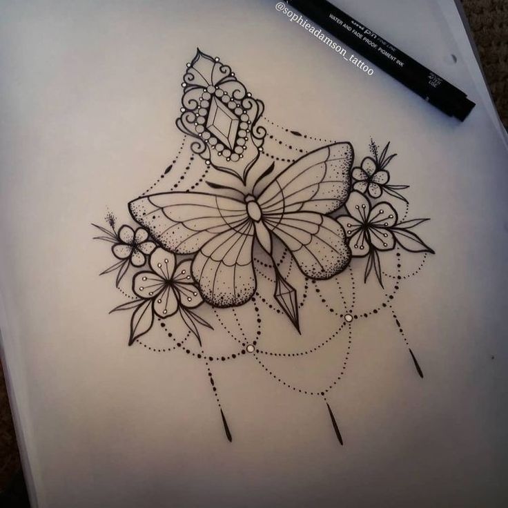 a drawing of a butterfly with flowers and dots on it's wings is shown