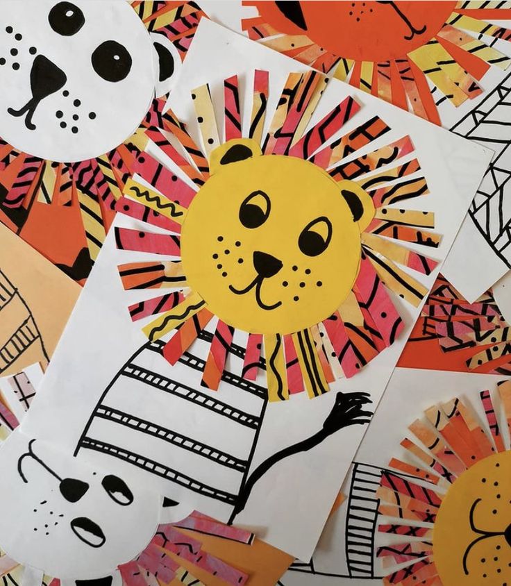 colorful paper cutouts with animals and lions on them