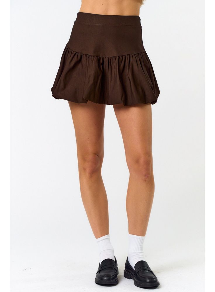 Both playful and chic, our Flared Bubble Skirt in Brown is a must-have this fall! This versatile skirt features a flared design that adds movement to your every step. Elevate your style game and embrace a confident, feminine look. Perfect for a day out or a night on the town! DETAILS Flared Hem Bubble Skirt Style Zipper Closure Color: Brown 74% Rayon, 22% Nylon, 4% Spandex Blue Blush is a young-contemporary women's clothing located in Los Angeles. They focus on sustainability and trendy items to Casual Tiered Skirt With Bottom Hem, Chic Gathered Skort, Casual Flare Skirt In Cotton, Brown Skirted Bottoms With Ruffled Skirt, Brown Skirted Bottoms With Ruffled Detail, Brown Ruffled Skirted Bottoms, Flared Skirt With Elastic Waistband For Day Out, Chic Pleated Hem Skort For Fall, Brown Ruffled Skirt Bottoms