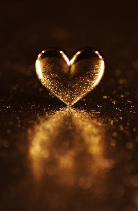 a heart shaped object with the words gratitude turns life into gold