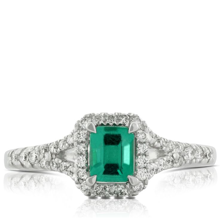 Emerald ring with 1/5 carat total weight of diamonds, in 14K white gold. 14k White Gold Emerald Cut Halo Ring, 14k White Gold Emerald Cut Promise Diamond Ring, Emerald Cut 14k White Gold Diamond Promise Ring, Lab Grown Diamond Ring With Halo Setting Emerald Cut, Classic Silver Emerald Ring With Pave Setting, Emerald Ring With Center Stone In 14k White Gold, Vvs Clarity Emerald Cut 14k White Gold Diamond Ring, Classic Emerald Ring With Pave Setting For Promise, Dazzling Diamond Ring With Halo Setting, Emerald Cut