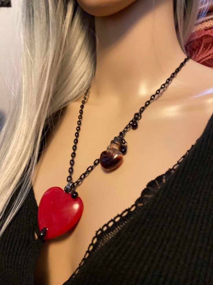 "Natural Red Jade, Bleeding Heart Necklace... With Blood Potion Bottle Red Jade The most Passionate and Stimulating Stone, A Stone of Love, and encouraging Love Energies.. Wear Red Jade to increase your Abundance, and Prosperity.. Leadership skills enhanced.. Ultimate Protection Their beautiful Natural Red Jade Is Big, measures 40mm The Black Stainless Steel Chain ( adjustable ) Measures 26\" With Glass.. Blood Drops" Blood Drop, Red Jade, Purple Gift, Love Energy, Wear Red, Rough Crystal, Potion Bottle, Jade Necklace, Jade Jewelry