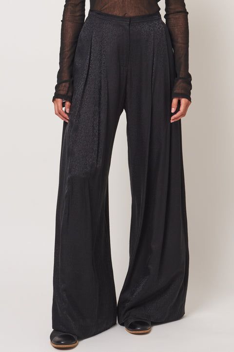 Chic Wide Leg Pants With Elastic Waistband For Evening, Silk High-waisted Wide Leg Pants For Party, Silk Wide-leg Pants For Party, Elegant Wide Leg Pants For Spring, Spring Evening Flowy Skirt, Silk Bottoms For Summer Night Out, Elegant Wide Leg Culottes With Elastic Waistband, Elegant Wide-leg Culottes With Elastic Waistband, Evening Wide-leg Pants With Elastic Waistband