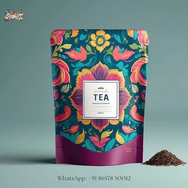 a bag of tea sitting next to a pile of ground coffee on a gray background