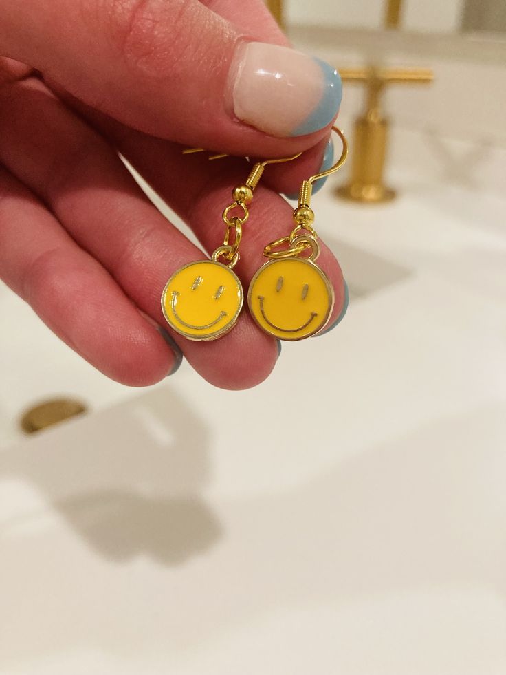 These are super cute smile earrings plus they are super trendy and preppy! Cute Round Earrings For Party, Cute Round Party Earrings, Casual Yellow Earrings Perfect For Gifts, Casual Yellow Earrings For Gift, Nickel-free Casual Party Earrings, Casual Nickel-free Earrings For Party, Trendy Yellow Hypoallergenic Jewelry, Trendy Hypoallergenic Yellow Jewelry, Casual Gold Earrings For Party