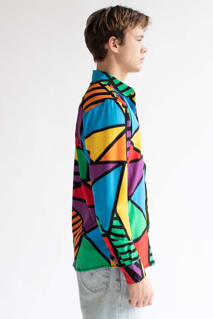 What's Your Angle Long Sleeve Button Up Shirt Bold Long Sleeve Tops With Graphic Print, Bold Graphic Print Long Sleeve Tops, Multicolor Long Sleeve Shirt With Graphic Print, Colorful Long Sleeve Vibrant Tops, Colorful Vibrant Long Sleeve Tops, Vibrant Multicolor Print Long Sleeve Tops, Vibrant Long Sleeve Graphic Print Tops, Colorful Long Sleeve Cotton Shirt, Vibrant Fitted Long Sleeve Tops