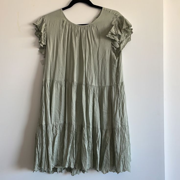 Brand New With Tags Size M Color: Silver Sage Green Flowy Tiered Midi Dress Casual Style, Flowy Tiered Midi Dress Casual, Flowy Tiered Casual Midi Dress, Casual Midi Length Dress With Ruffle Hem, Casual A-line Dress With Ruffle Hem, Spring A-line Rayon Midi Dress, Summer Midi Mini Dress With Ruffles, Mid-length Cotton Mini Dress For Spring, Casual Green Mid-length Mini Dress