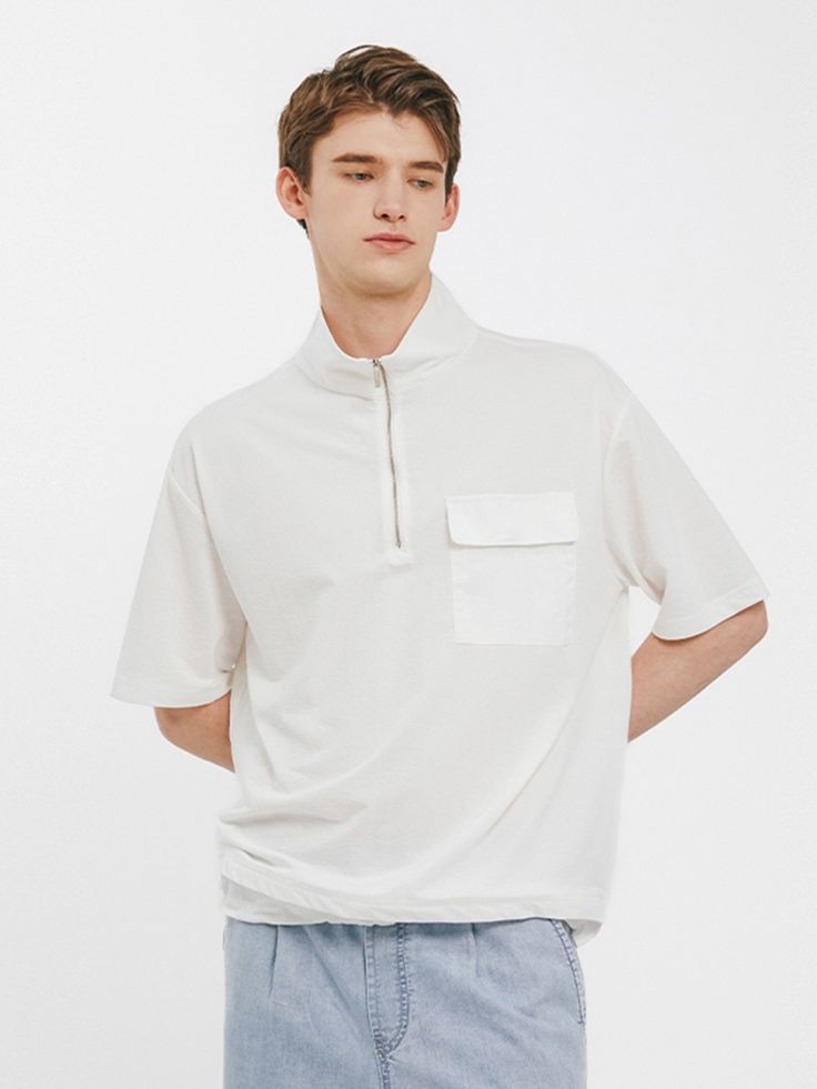 Spring Streetwear Half-zip Top, Casual Half-zip Workwear Tops, Relaxed Fit Half-zip Top For Streetwear, Spring Half-zip Top With Relaxed Fit, Spring Relaxed Fit Half-zip Top, Relaxed Fit Half-zip Spring Top, Casual White Polo Shirt With Pockets, Cotton Half-zip Tops For Streetwear, Casual White Half-zip Top