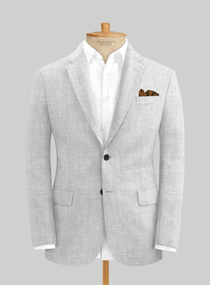 Maintain a distinct professional appearance by adding an extra bit of flair with our Italian Zod Light Gray Linen jacket. Crafted from linen, this jacket will keep you cool, sharp and stylish in summer. Combine it with a matching waistcoat and trousers a crisp white and brown derby shoes. 
  Look Includes   Italian Zod Light Gray Linen Fabric  Two Button Jacket Style  Notch Lapel   Horn Solid  Buttons  Single Vent  Three Cuff Buttons   You can change the look during customization if required. Gray Linen Suit, Tan Brogues, Grey Tweed Suit, Herringbone Tweed Jacket, White Linen Suit, Green Velvet Jacket, Peaky Blinders Suit, Tweed Overcoat, Royal Blue Suit