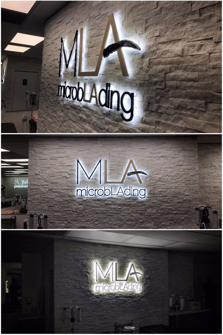 indoor sign that reads "MLA" with "microbLAding" underneath. Light is coming out of the back of the letters and shining onto a stone wall. Company Logo Wall, Outdoor Logo, Lobby Sign, Medical Office Design, Office Signage, Outdoor Logos, 3d Business, Backlit Signs, Led Logo