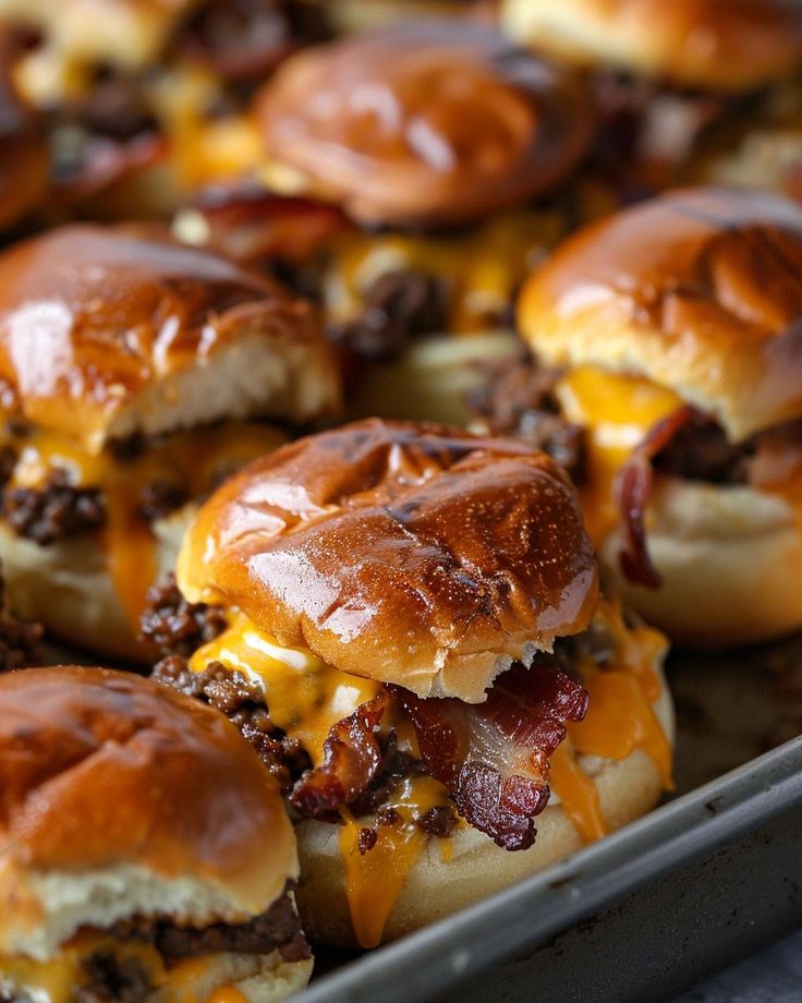 Divine! Love making these babies in the oven! Dinner Entrees For A Crowd, Slider Bar Ideas Mini Burgers, Quick Savory Dinner, Bacon Burger Sliders, Lunch Tailgate Food, Easy Crowd Dinners, Quick Lunch For A Crowd, Handheld Food For A Crowd, Bacon Cheese Burger Sliders