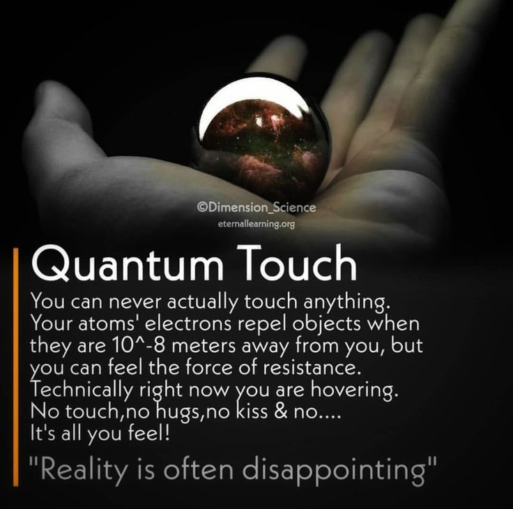 a hand holding an object with the words,'quantum touch '