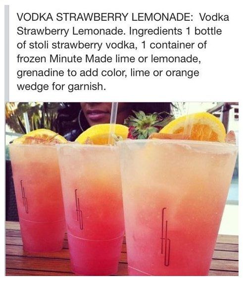 two glasses filled with lemonade sitting on top of a table next to each other