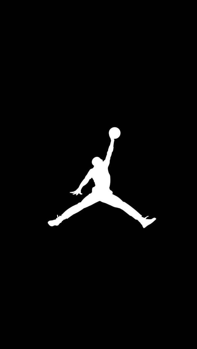 a black and white silhouette of a basketball player