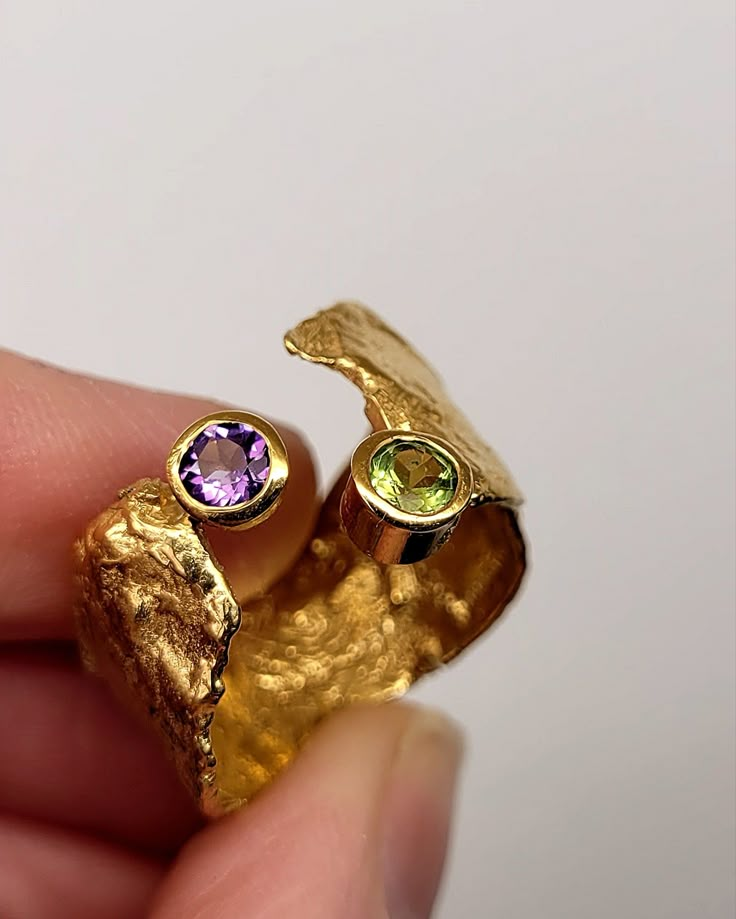 A stunning Faerie Tale Ring,18ct yellow gold plated, set with stunning 4mm Amethyst & Peridot gemstones. This is a made to order ring - allow approx 4 weeks for delivery Yellow Gold Sapphire Open Ring In Unique Style, Yellow Gold Sapphire Ring With Open Ring Style, Exquisite Gold Multi-stone Sapphire Ring, Gold Gemstones Ring With Gemstone Accents, Luxury Gold Amethyst Ring With Bezel Setting, Unique Gold Sapphire Ring Hallmarked, Gold Sapphire Ring With Gemstone Accents For Anniversary, Unique Yellow Gold Rings With Birthstone, Yellow Gold Multi-stone Fusion Gemstones