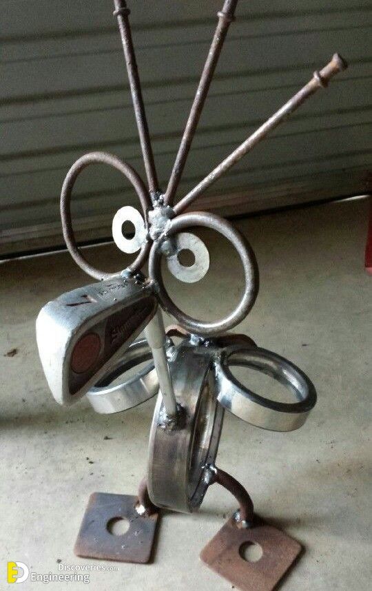 a metal sculpture made to look like an insect