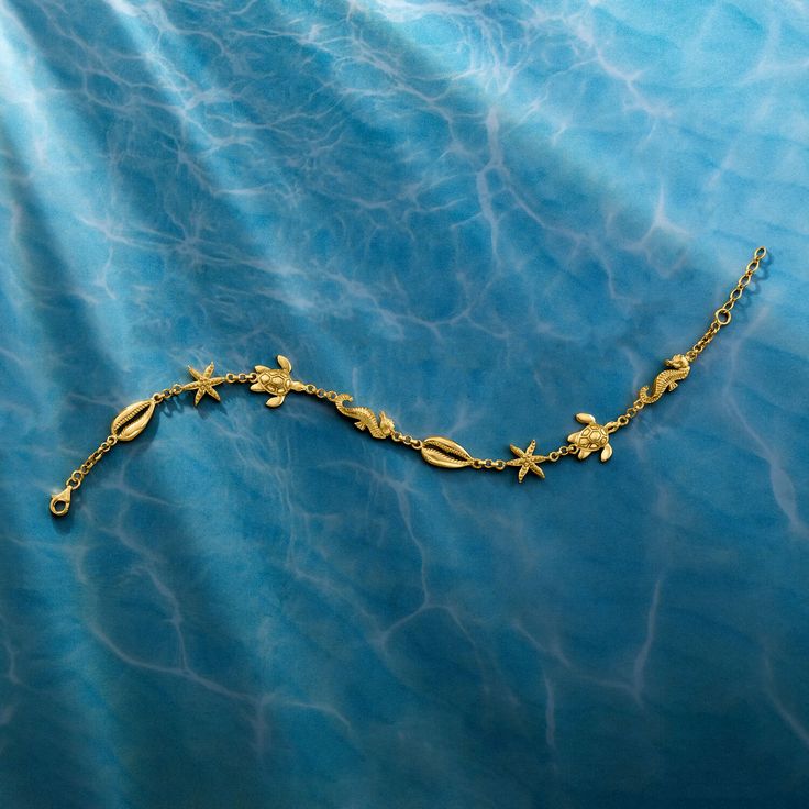 Ross-Simons - 18kt Gold Over Sterling Sea Life Anklet. 10". Here's the perfect beachy accessory. Crafted of textured and polished 18kt yellow gold over sterling silver, this anklet boasts shells, starfish, sea turtles and seahorses. Ideal for all of your summer soirees! Features a 1" extender. Lobster clasp, 18kt gold over sterling sea life anklet. Dr Accessories, Beachy Bracelets, Beach Basket, Sea Jewelry, Sea Inspired, Summer Soiree, Seahorses, Sea Turtles, Hand Jewelry