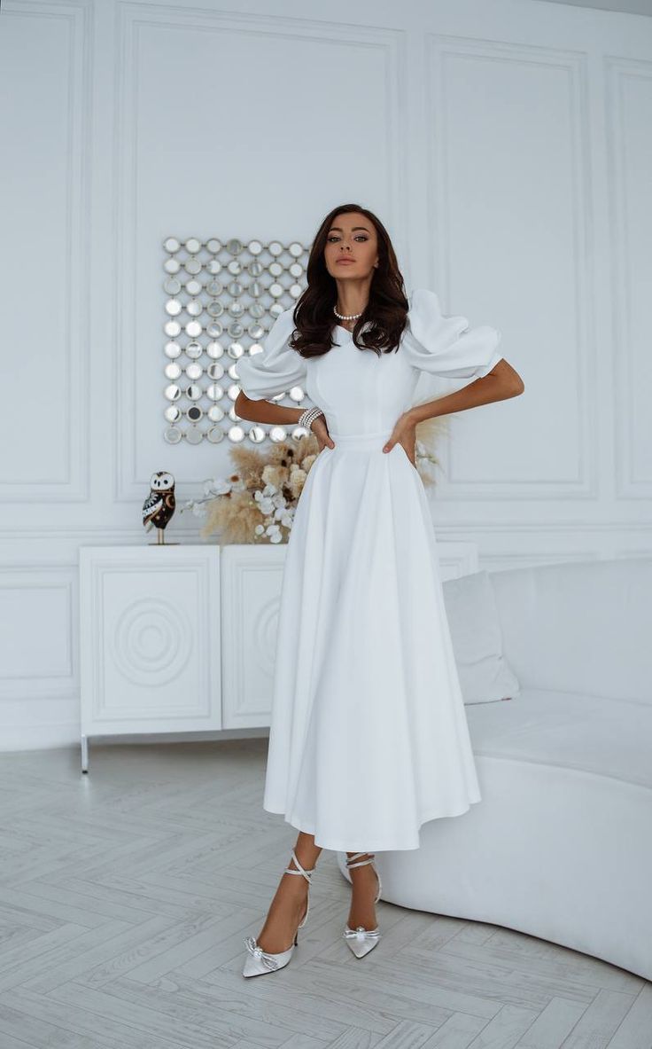 Fabric: Crepe Viscose 50%, Polyester 40%, Elastane 10% Round neckline Puff sleeves Short sleeves Backless dress Midi length Colors: White Confirmation Dresses, White Wardrobe, Chic And Elegant, White Midi, Puff Sleeve Dresses, Red Sky, Reception Dress, Puffed Sleeves Dress, Dress Midi